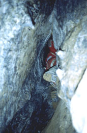 Lynne Robinson in the rift at the base of the entrance pitch (Photo: Dave Binks)