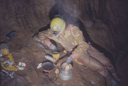 Simon Cawthan has a brew at underground camp (Photo: Dave Binks)